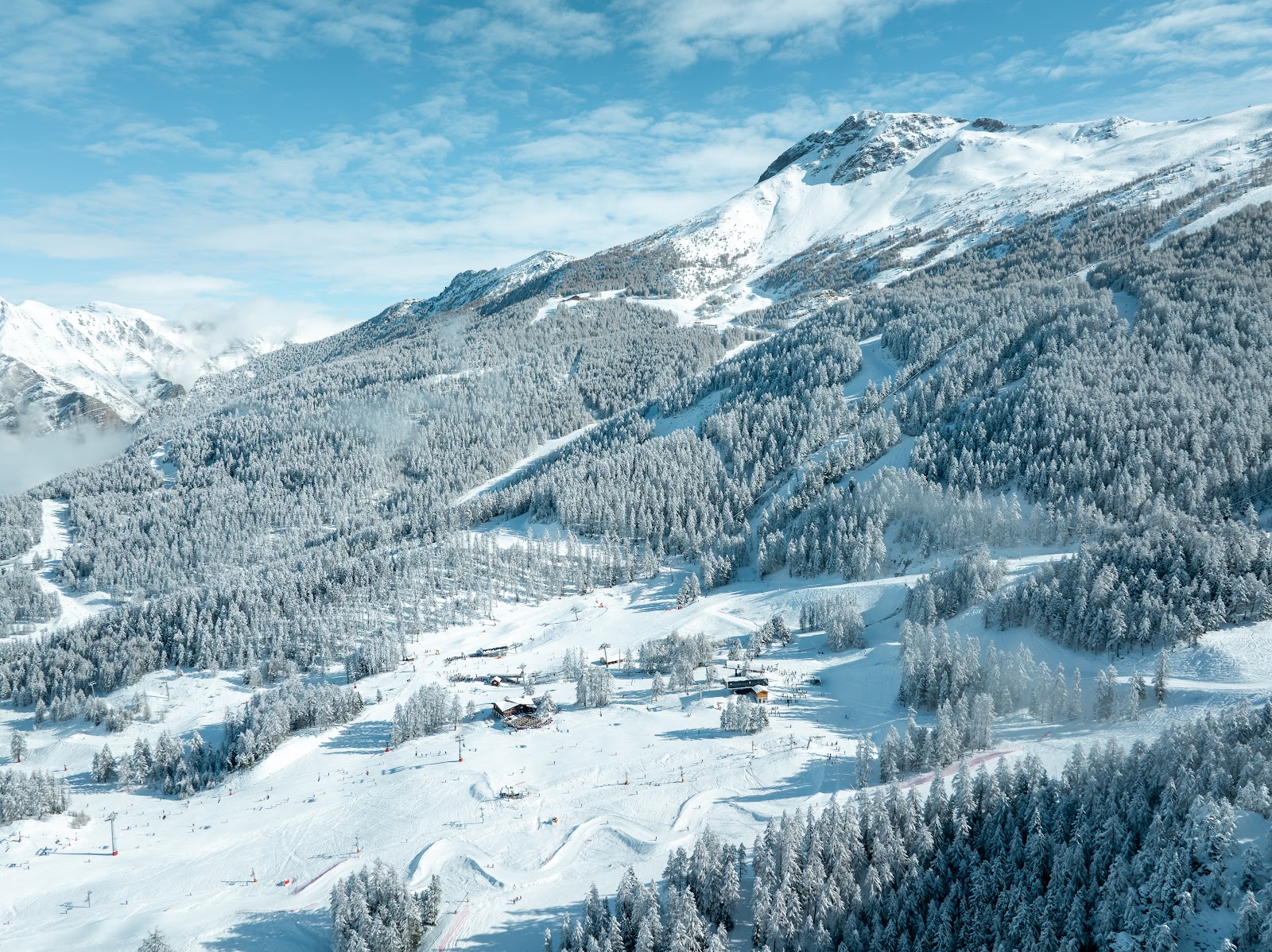Les Orres ski station above the Serre Poncon lake in winter
