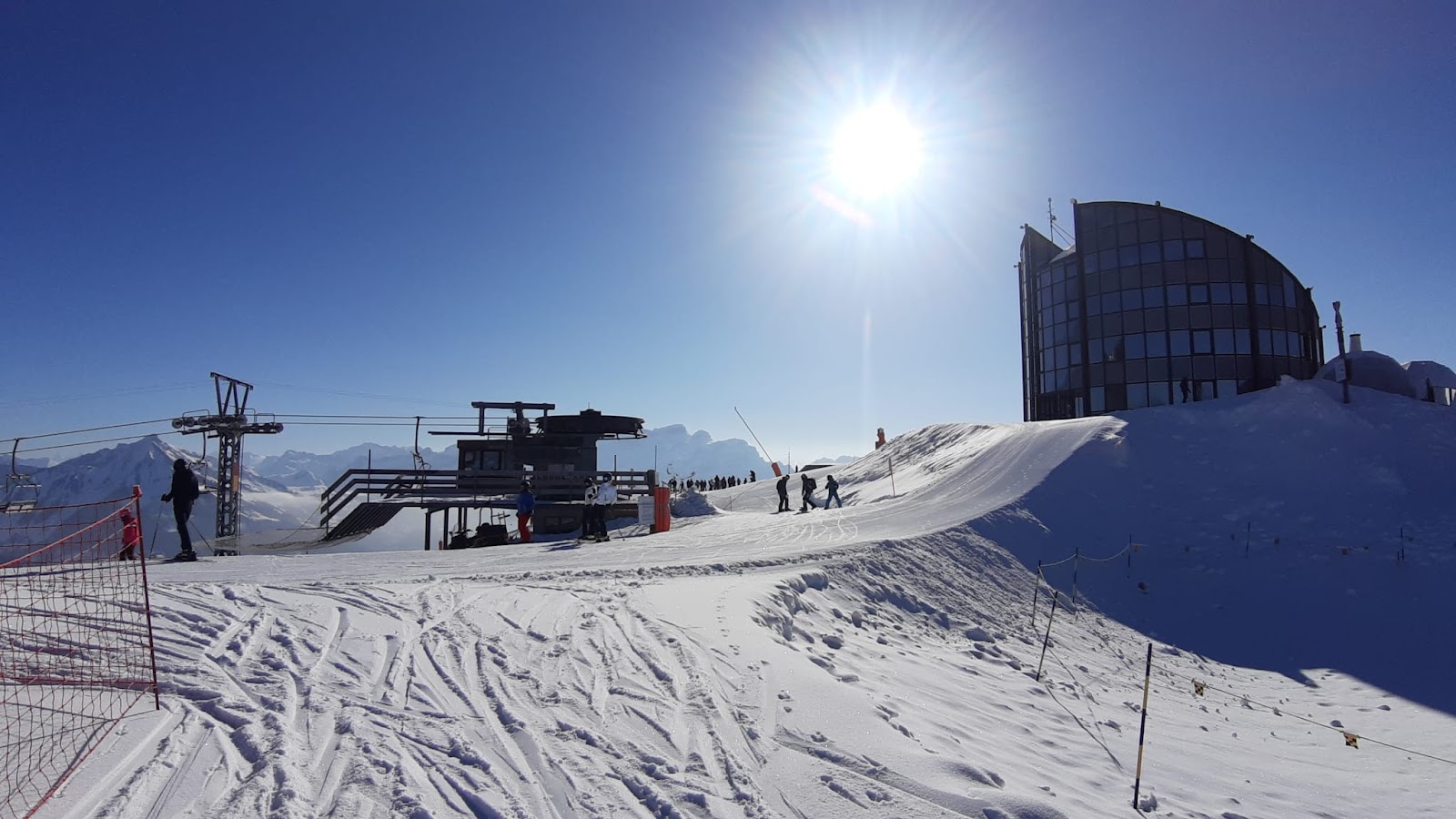 Sunny pistes above Leysin with the Dents du Midi across the valley