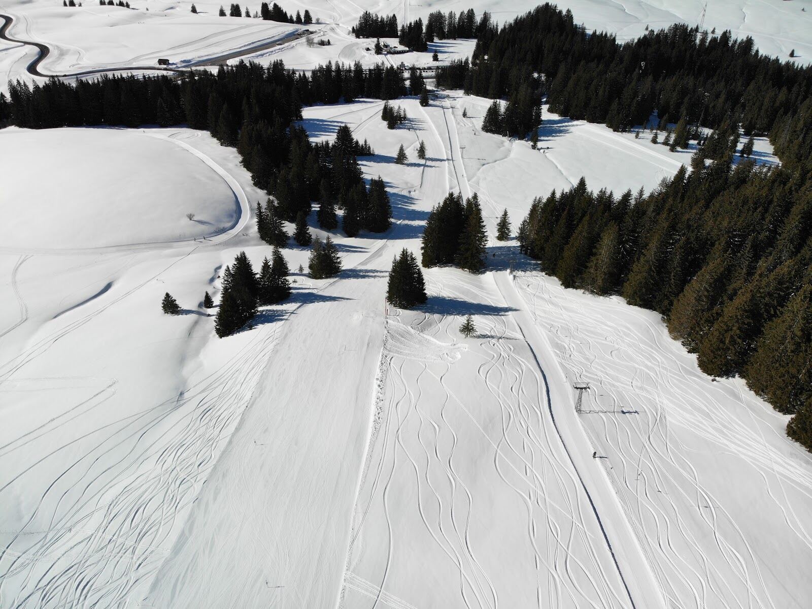 Snow covered chalets and hotels in Leysin village in winter