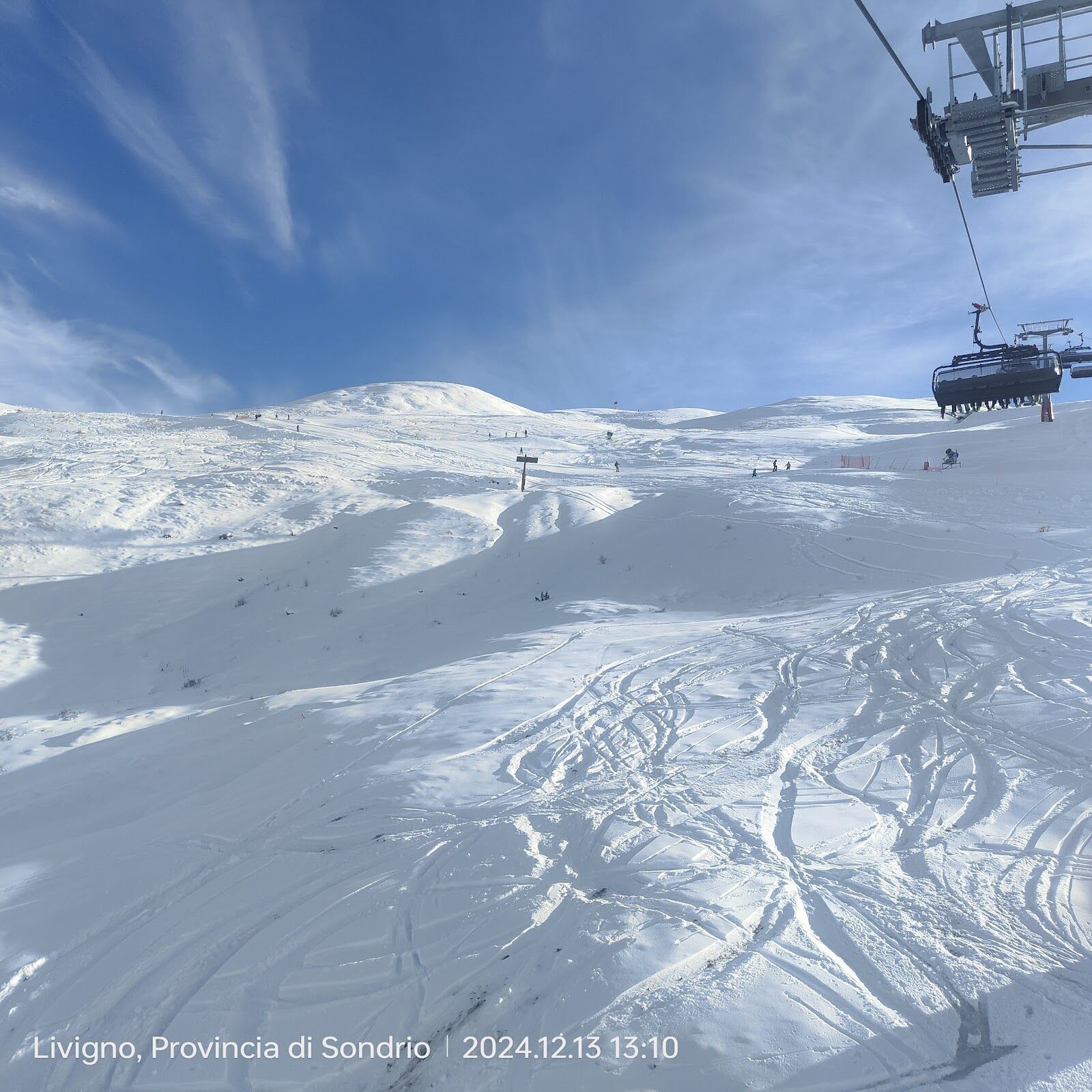 The long village of Livigno strung along its valley in deep snow