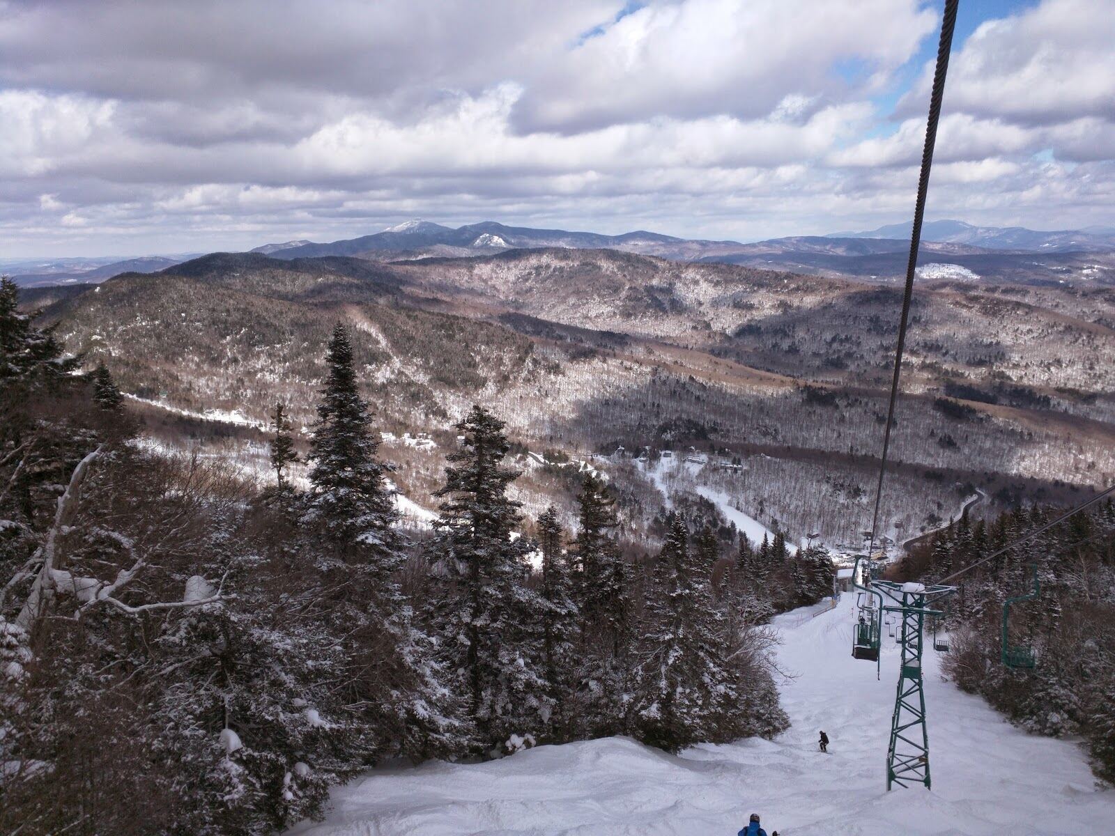 Snow covered natural terrain and the single chair at Mad River Glen in Vermont