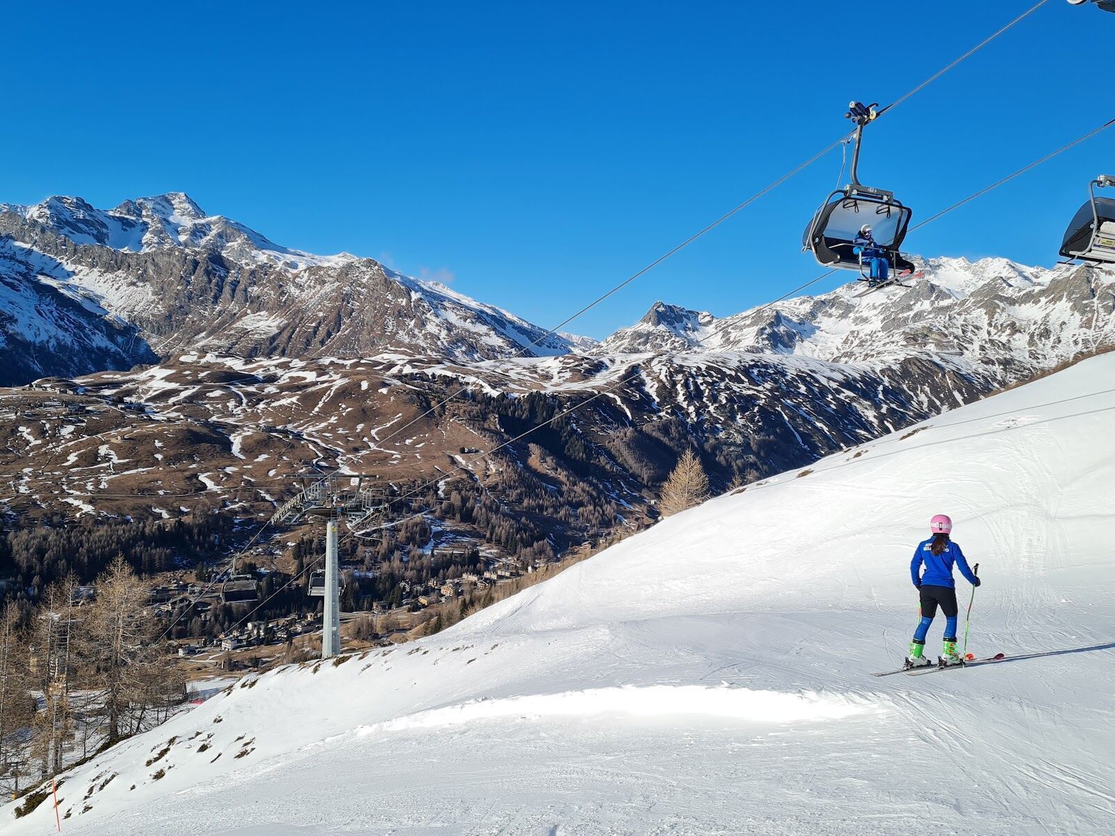 Gentle family pistes above the village of Madesimo