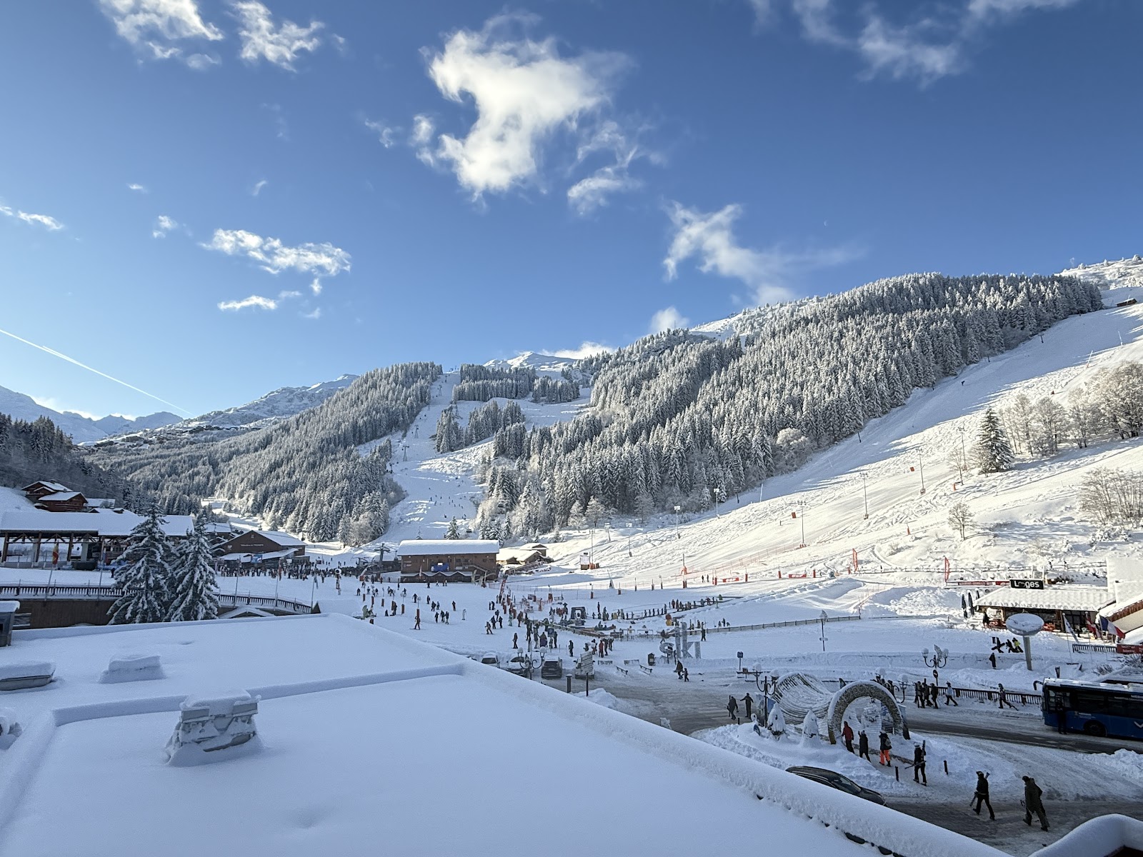 A wide groomed piste above Meribel in the Three Valleys