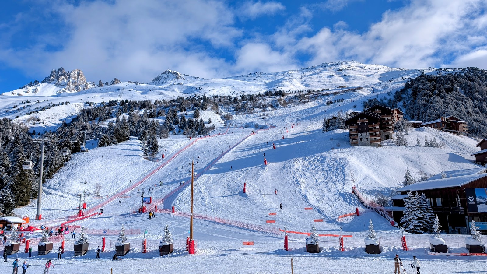 Timber chalets and snow covered roofs in Meribel