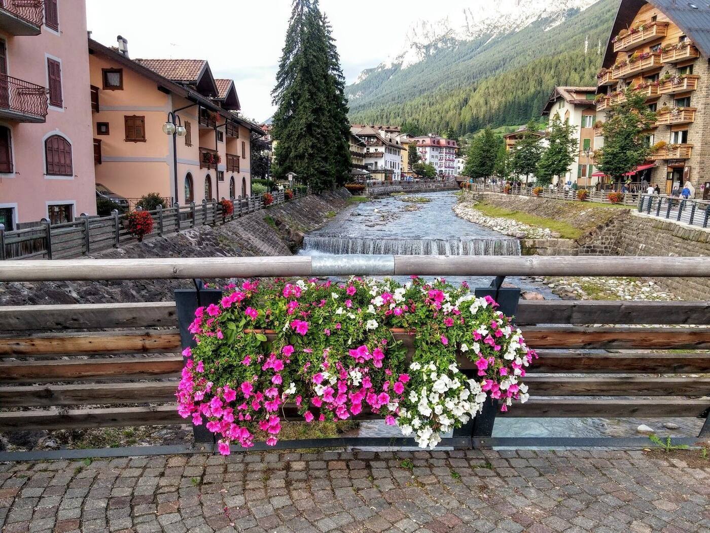 The town of Moena in the Val di Fassa below the Dolomite peaks in winter