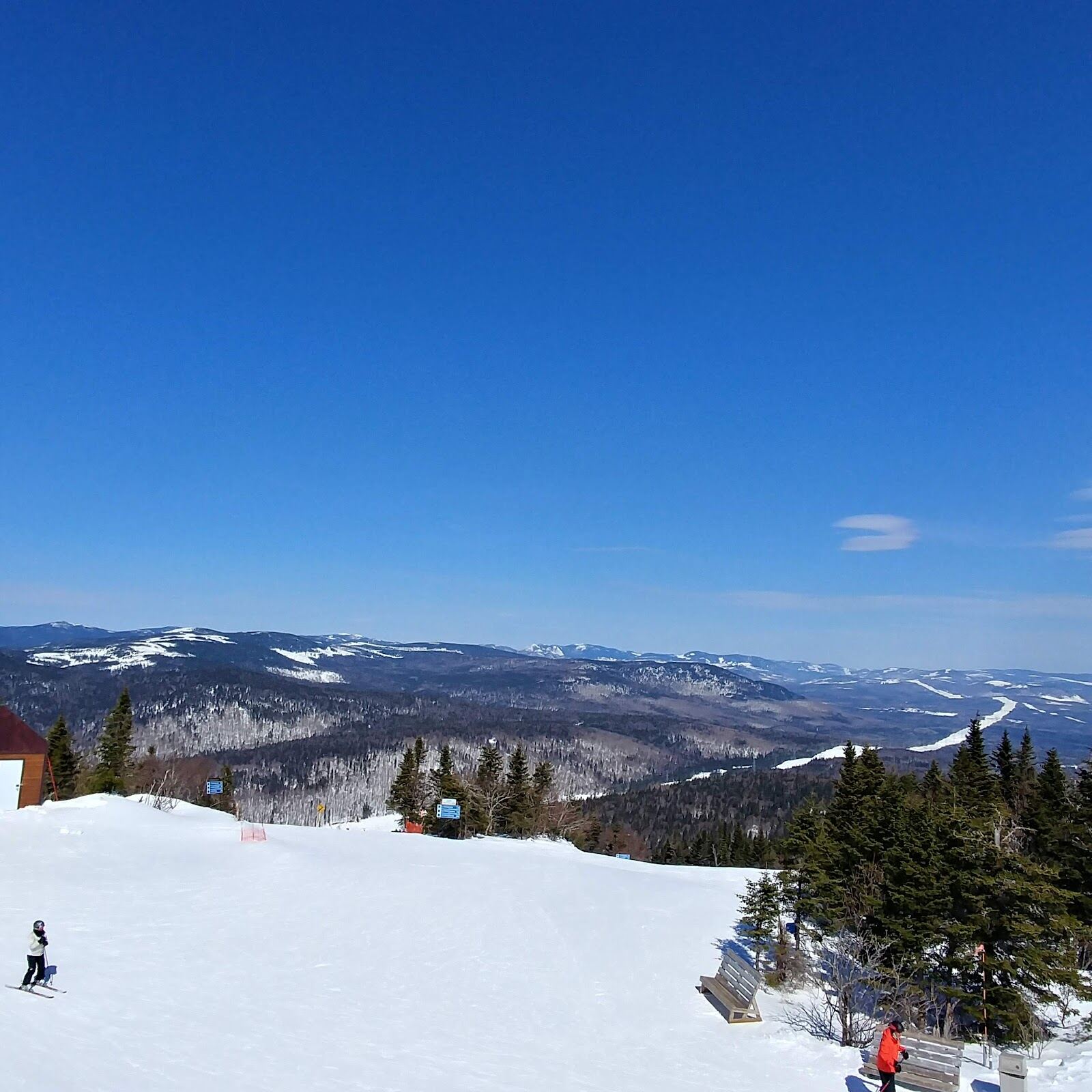 Snowy slopes of Mont Sainte Anne with views over the St Lawrence River