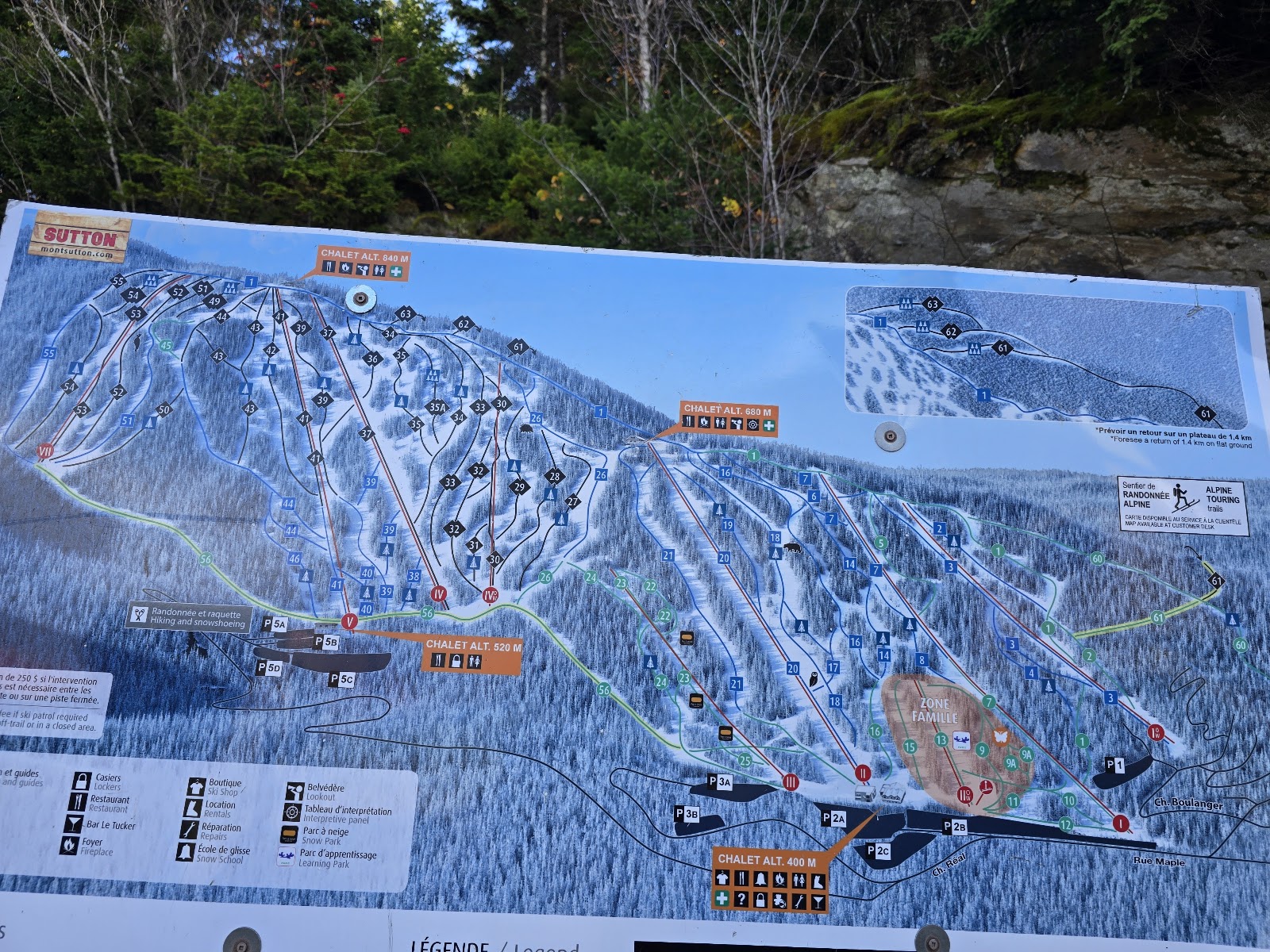 Groomed trails and chairlift at Mont Sutton in winter