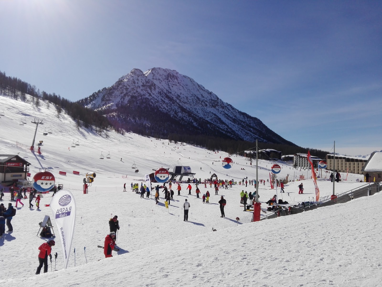 Sunny open pistes above the village of Montgenevre