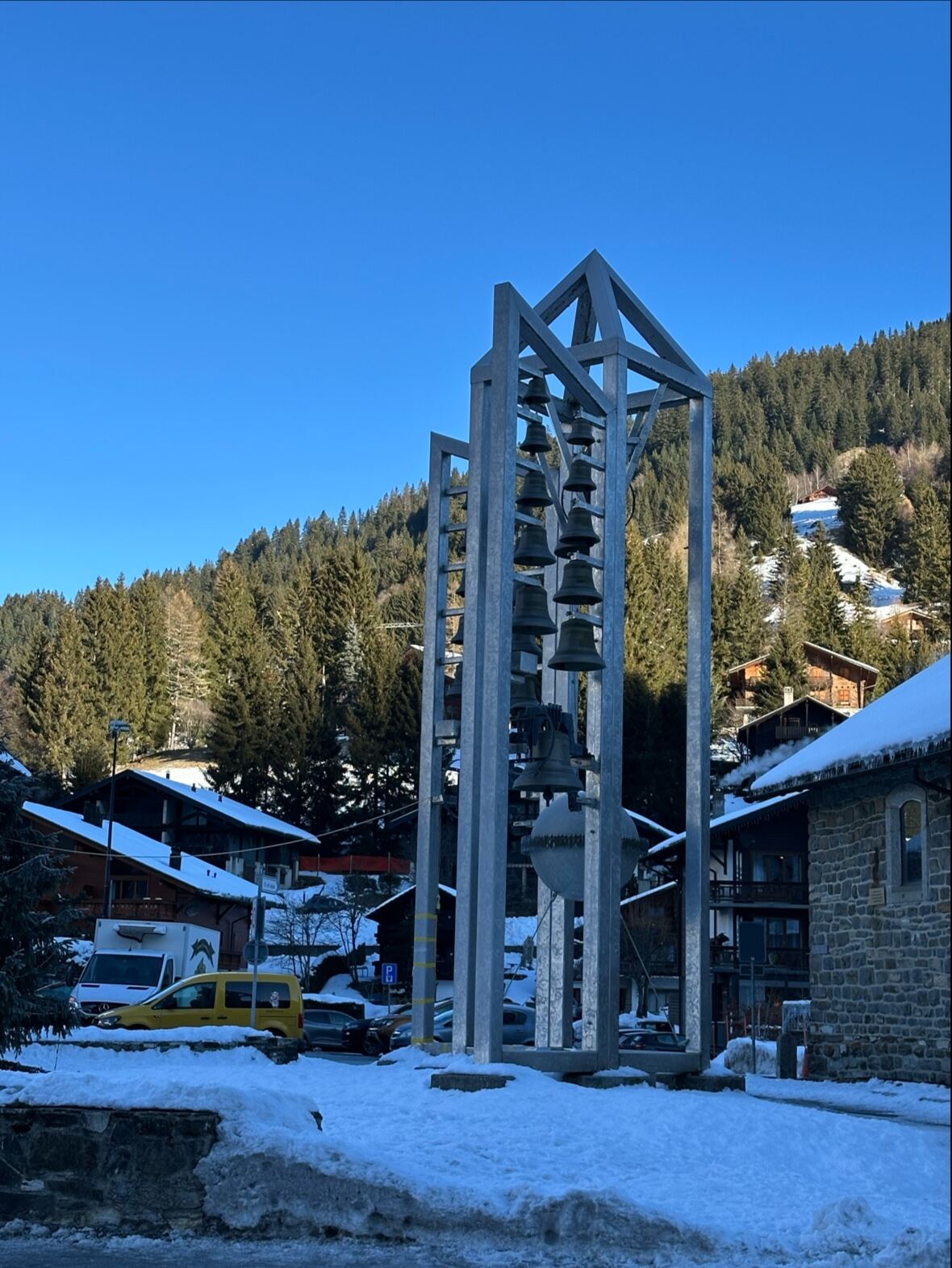 The sunny traditional village of Morgins under snow