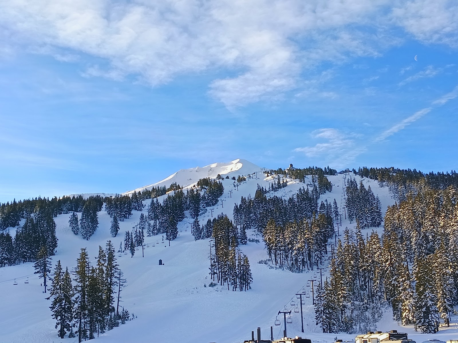The snow covered cone of Mount Bachelor volcano in Oregon