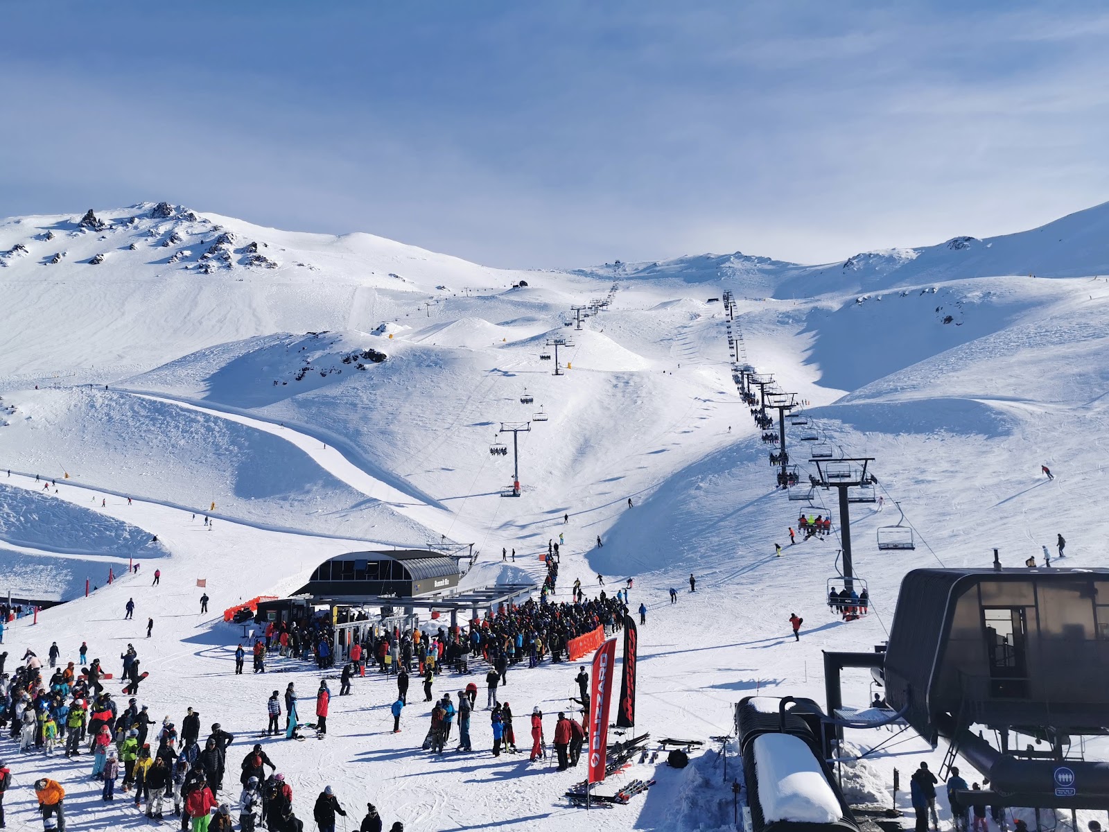 Chairlift and snowy basin at the Mt Hutt ski area