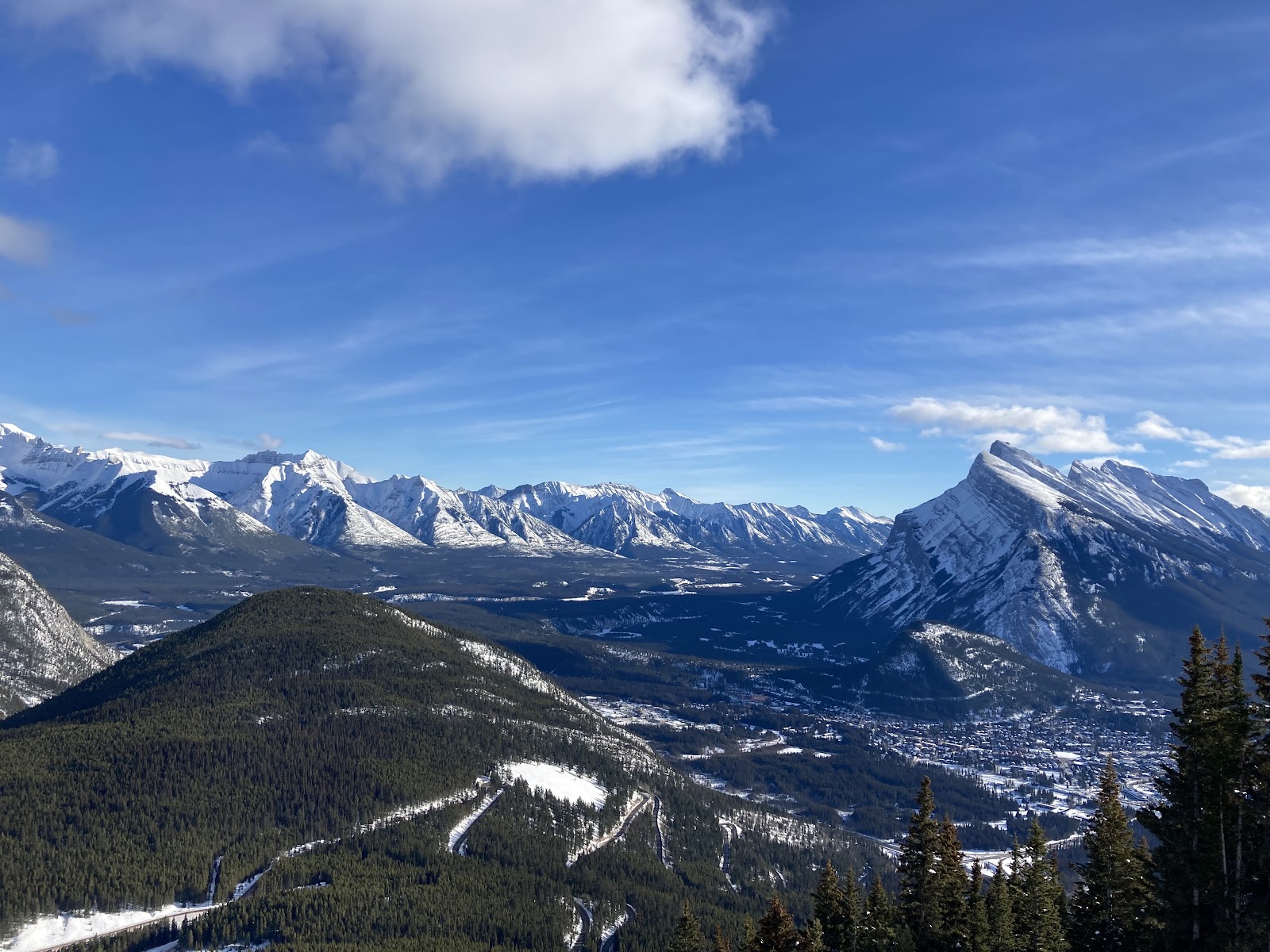 Skier on the steep ungroomed terrain off the North American chair at Mt Norquay