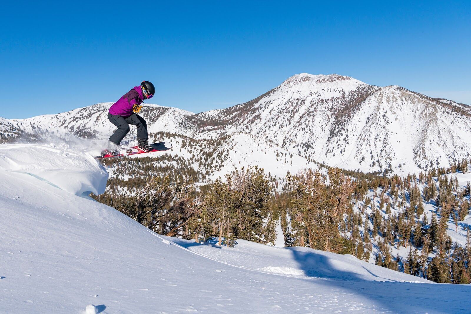 Chairlift climbing the open upper bowls of Mt Rose in winter