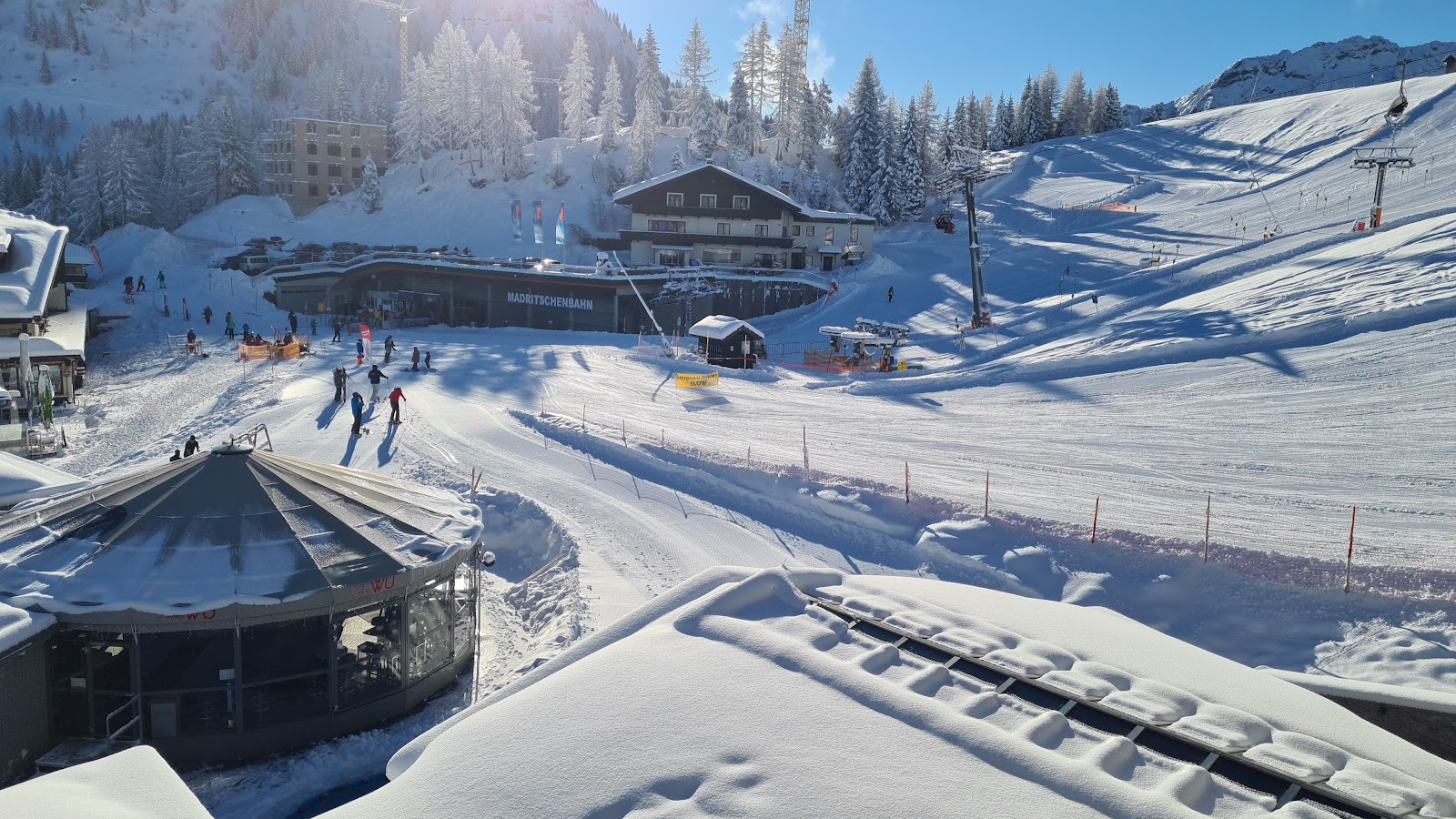Sunny pistes at Nassfeld on the Austrian Italian border under blue skies