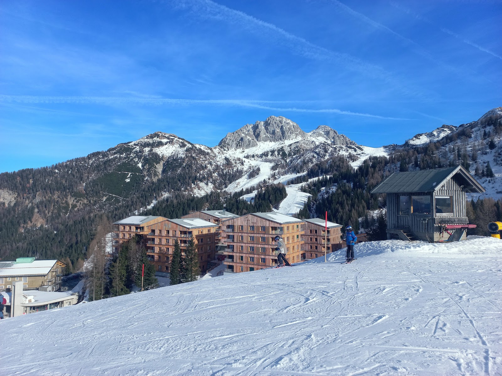 Sunny wide pistes at Nassfeld with the Carinthian mountains behind