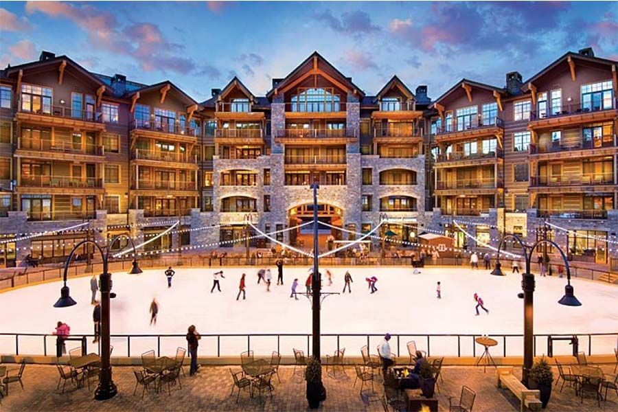 Tree lined pistes and the village at Northstar near Lake Tahoe