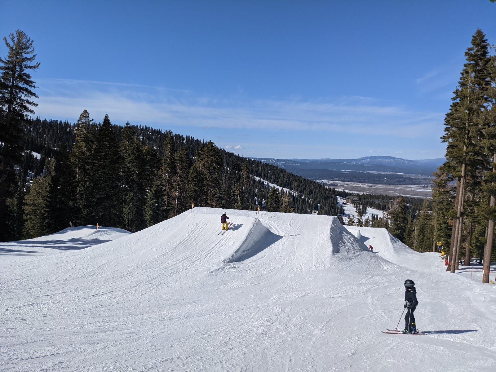 Snowy forested slopes above Lake Tahoe at Northstar