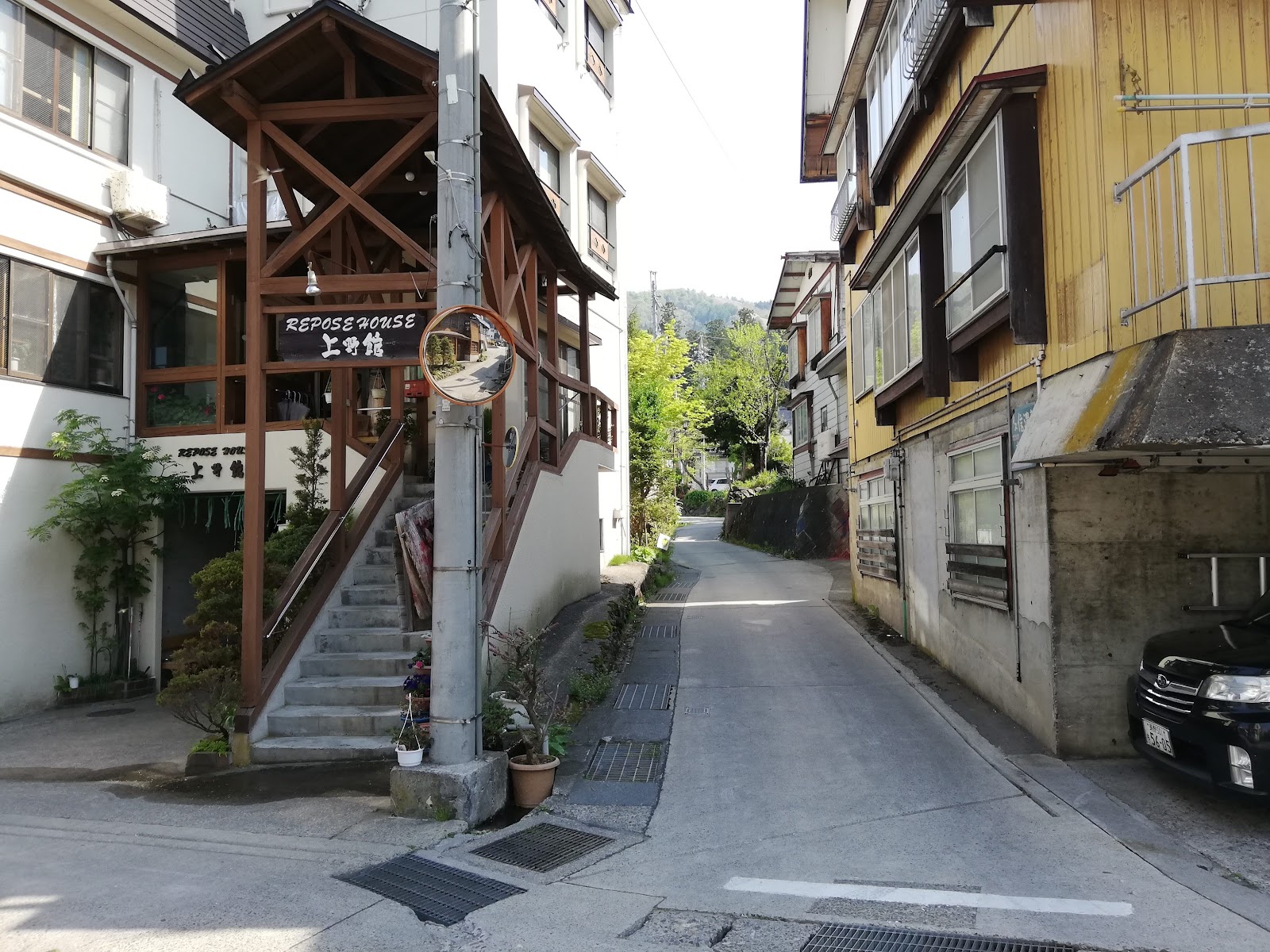 Steam rising from a public hot spring bath in Nozawa Onsen village