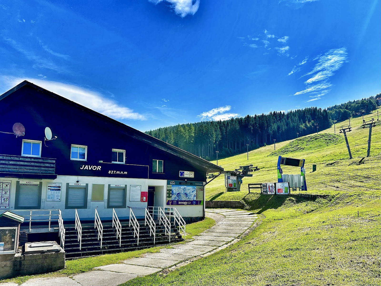 A cozy timber mountain hut serving food and Czech beer