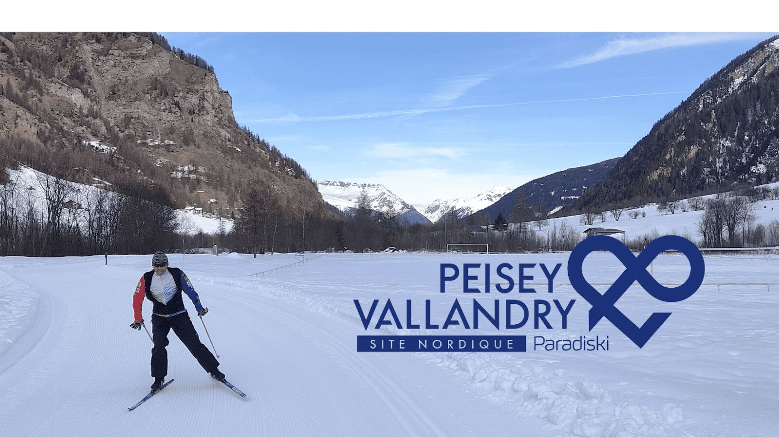 The wooded slopes and small ski station of Peisey Vallandry under winter snow