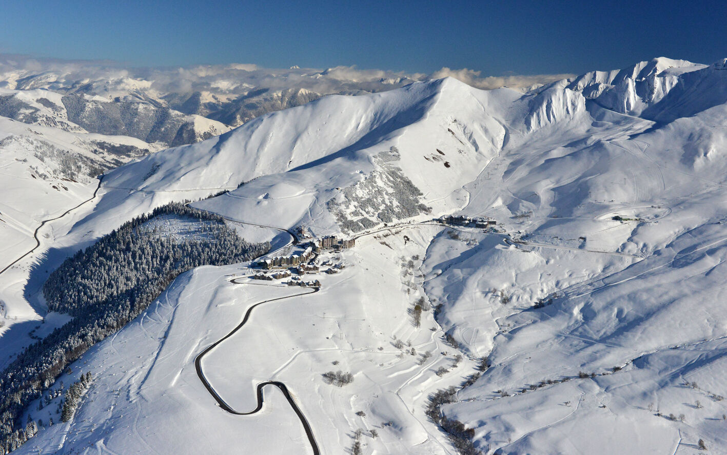 Ridge top pistes of Peyragudes with views across two Pyrenean valleys