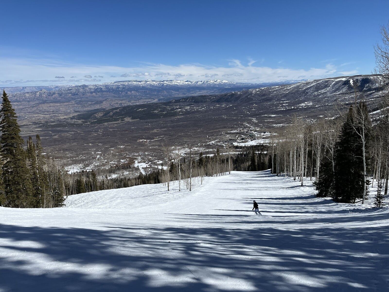 Sunny wide open pistes on the flank of the Grand Mesa at Powderhorn