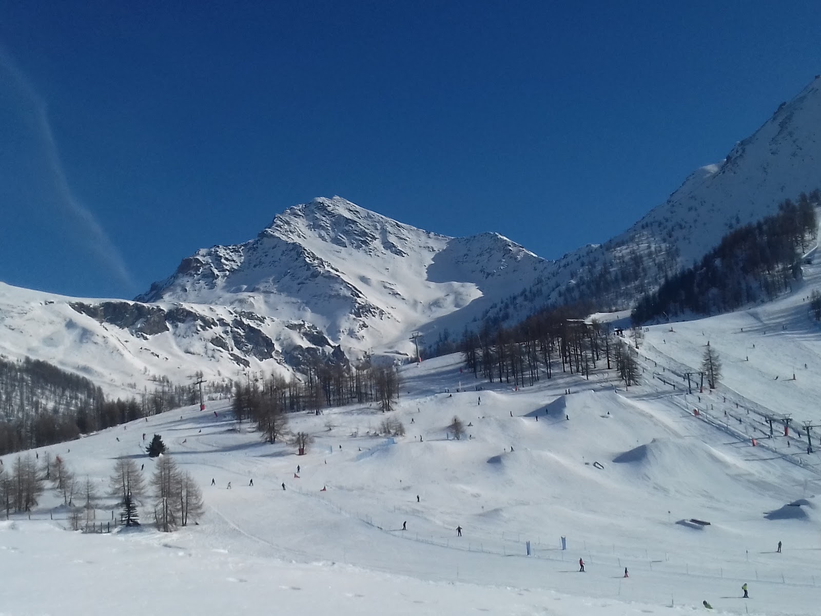 Gondola rising from Pragelato toward the Via Lattea slopes