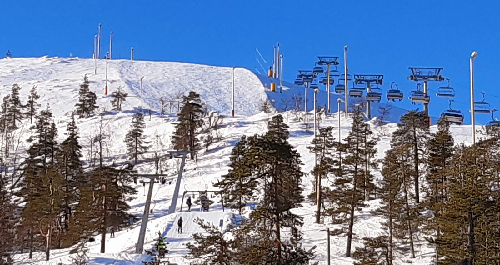 Floodlit pistes on the Pyha fell in the Lapland twilight