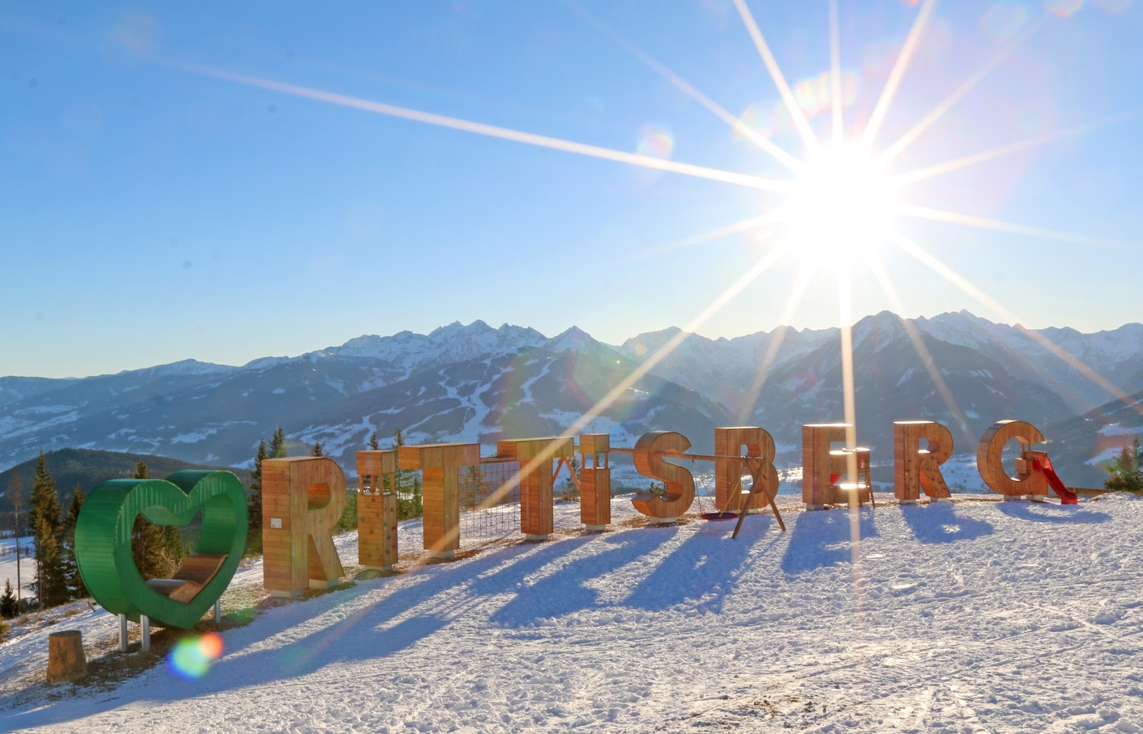 The sunny Ramsau plateau under the Dachstein south walls in winter