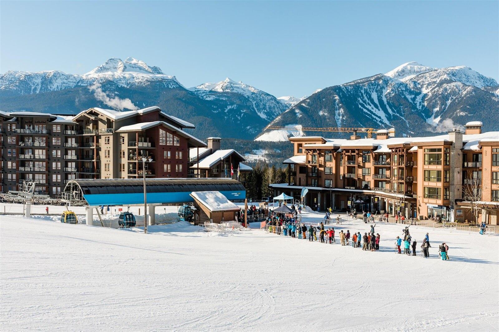 Deep snowy slopes and forested peaks above Revelstoke Mountain Resort in British Columbia