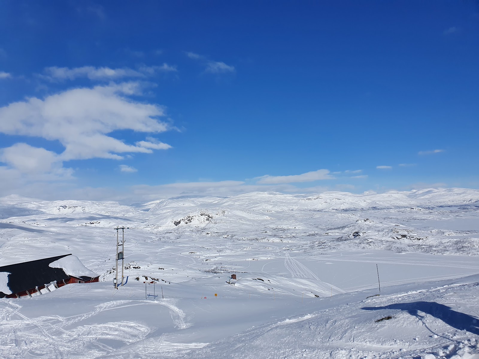 Snowy Arctic fells above the lake at Riksgransen in Sweden