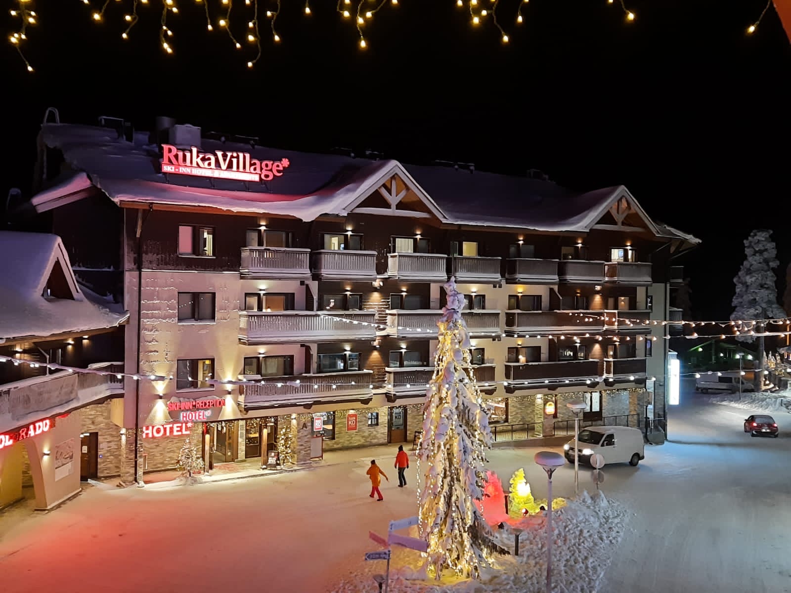 A floodlit night skiing slope under the polar darkness at Ruka