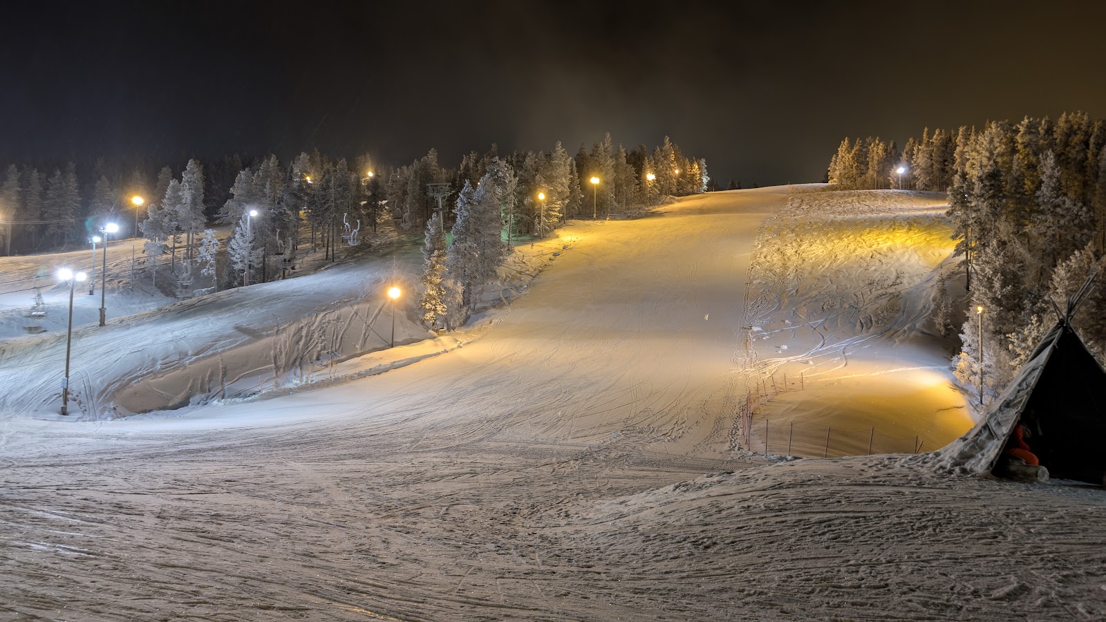 Snowy Saariselka resort village under a Lapland winter sky