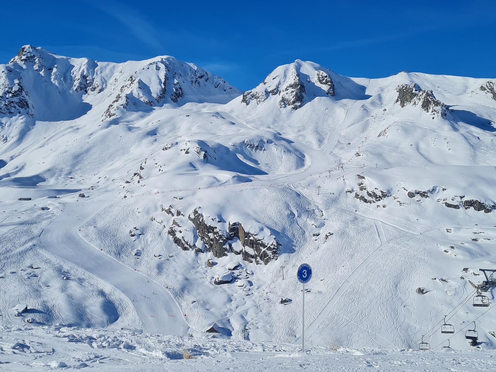 Wide sunny pistes above Saint Sorlin d Arves in the Maurienne
