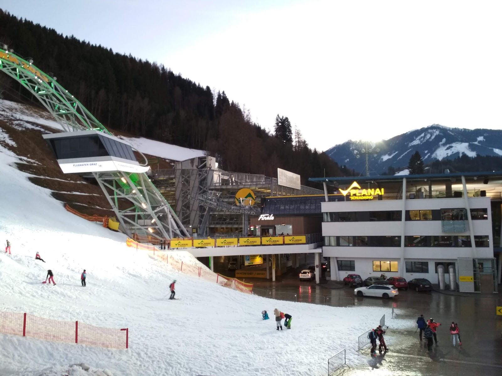 The town of Schladming in the Enns valley with snowy peaks behind