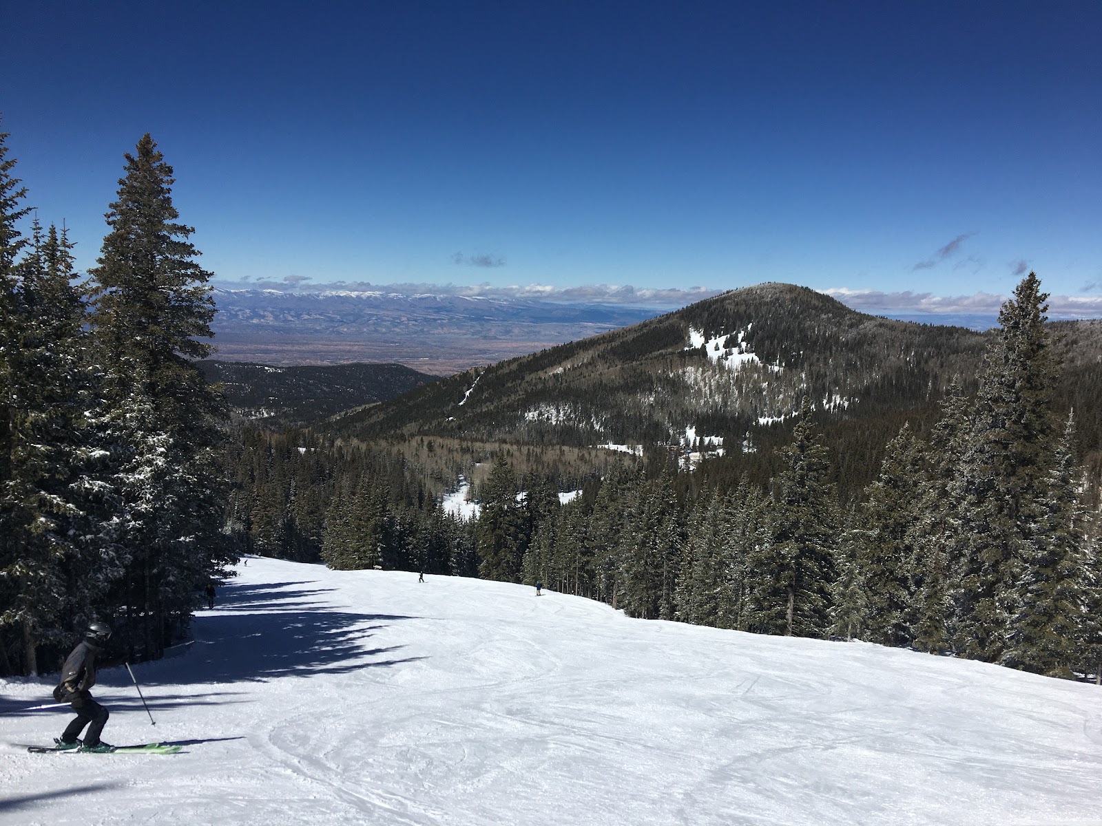 Skiers on a blue run at Ski Santa Fe