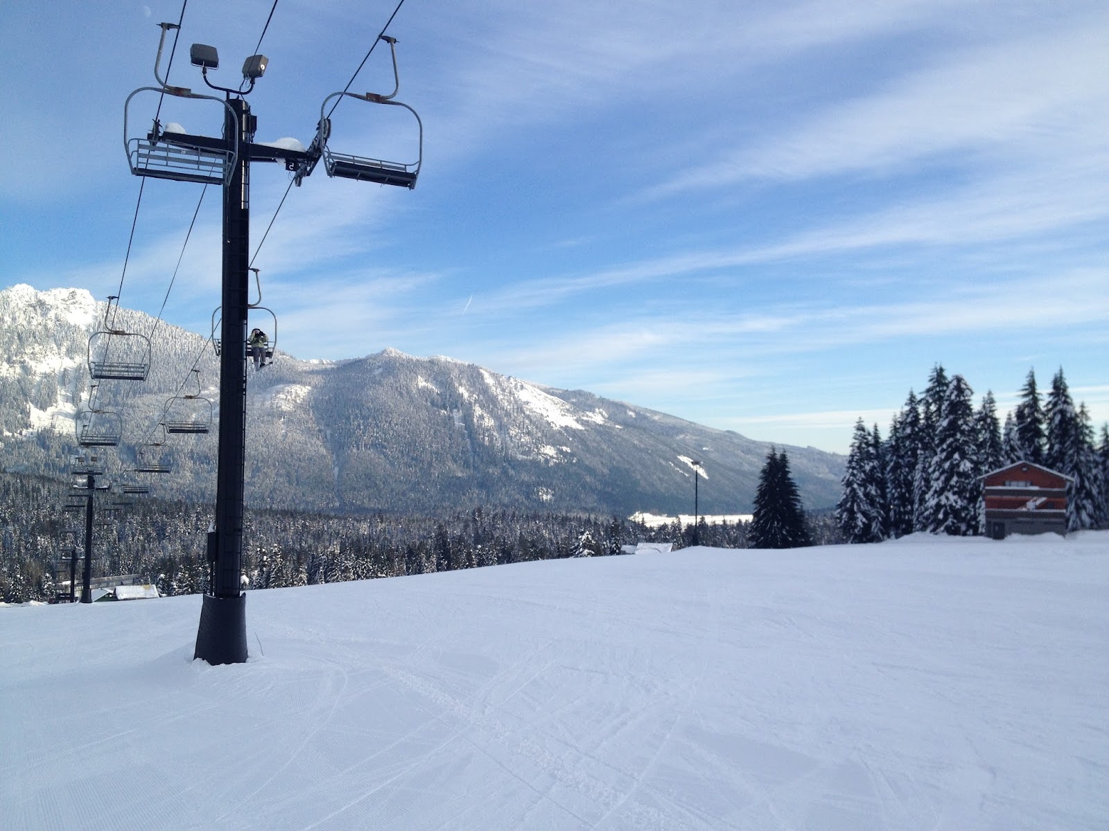 Snow covered slopes and lifts at The Summit at Snoqualmie in Washington