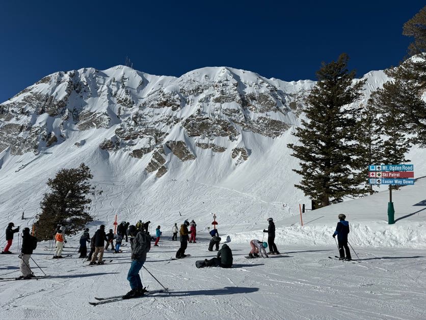 Steep snowy terrain and grand day lodges at Snowbasin near Ogden Utah