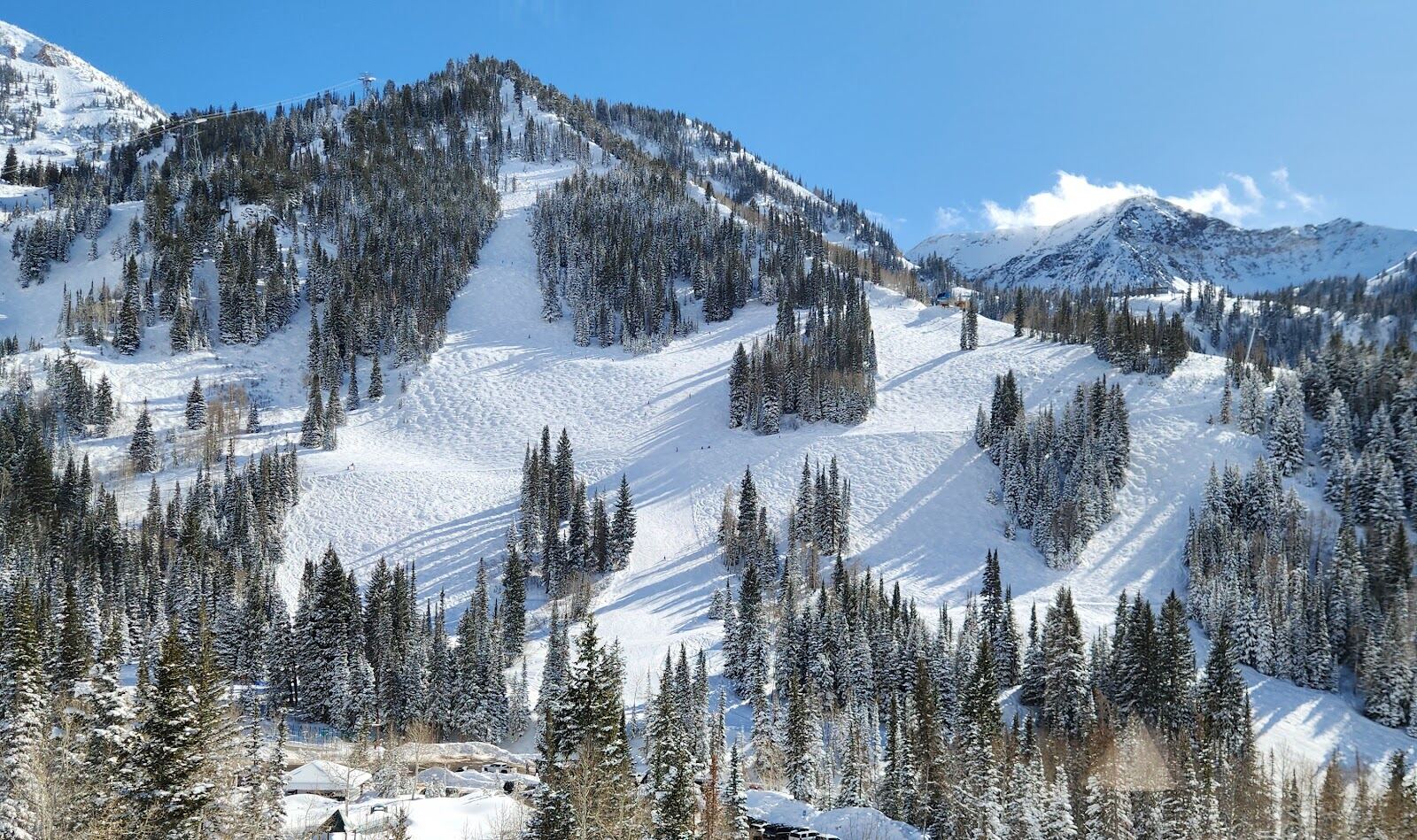 The Snowbird aerial tram climbing toward the summit ridge