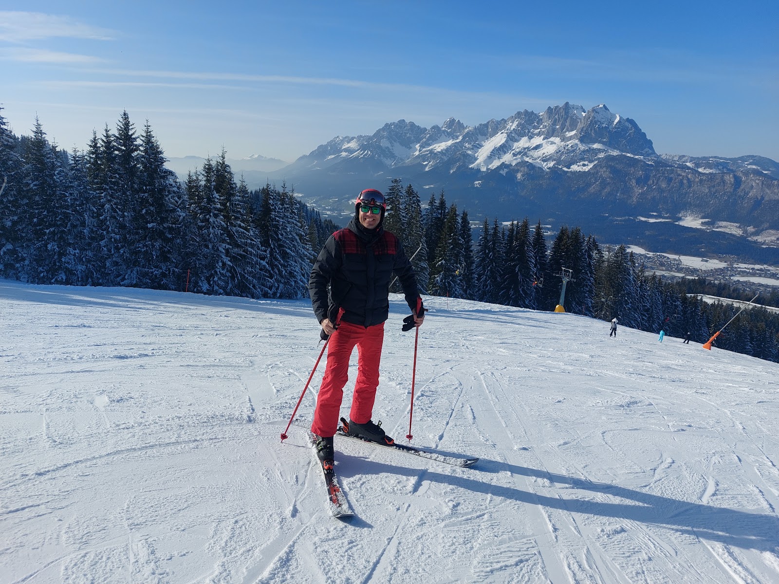 Snowy ski slopes and the Wilder Kaiser peaks near St Johann in Tirol