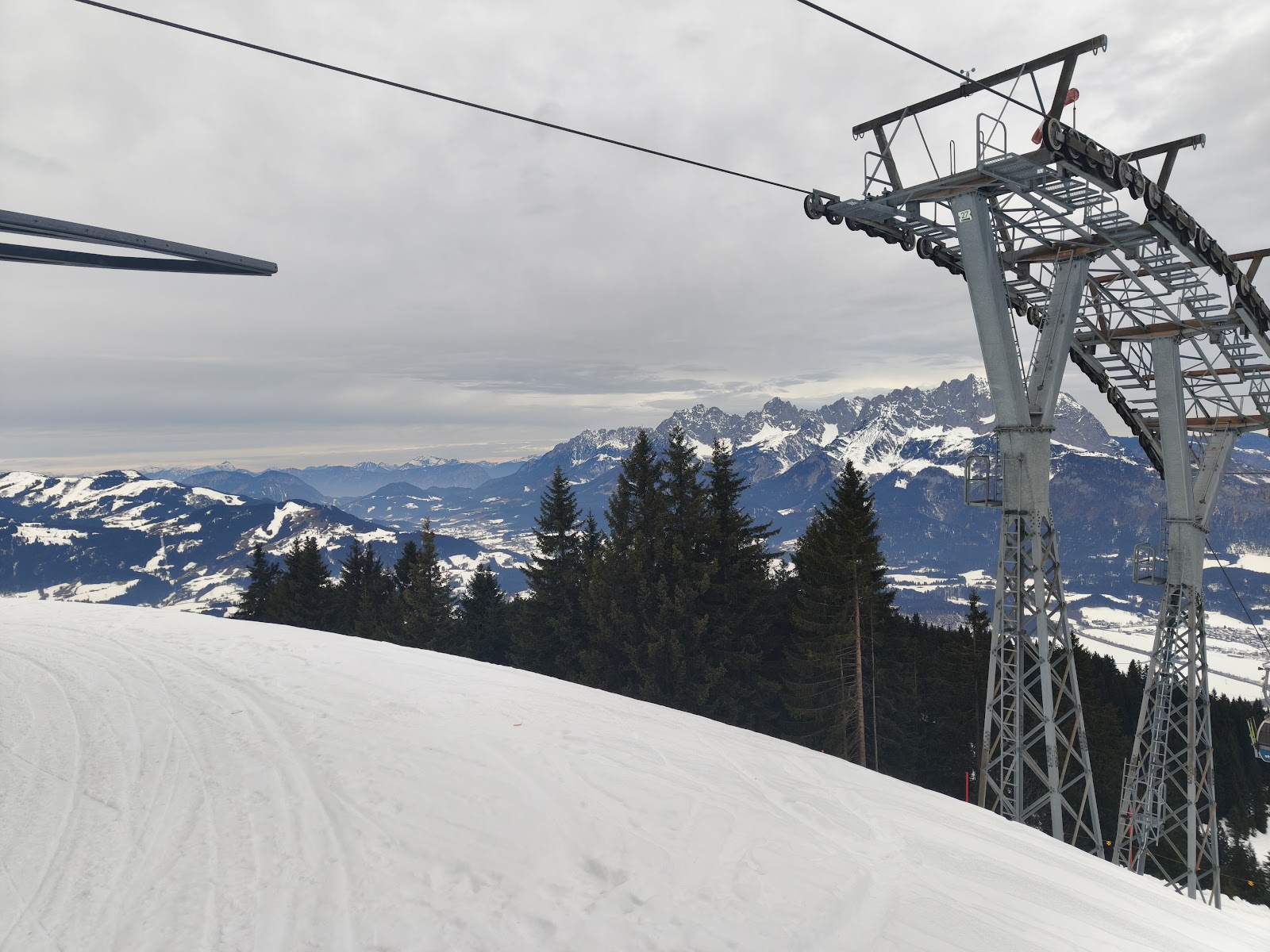 The town of St Johann in Tirol in winter with church towers