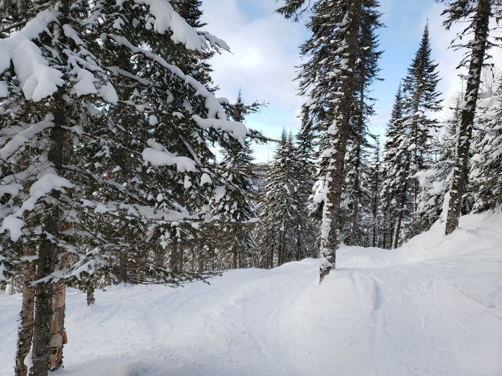 The base village and lifts at Stoneham under snow