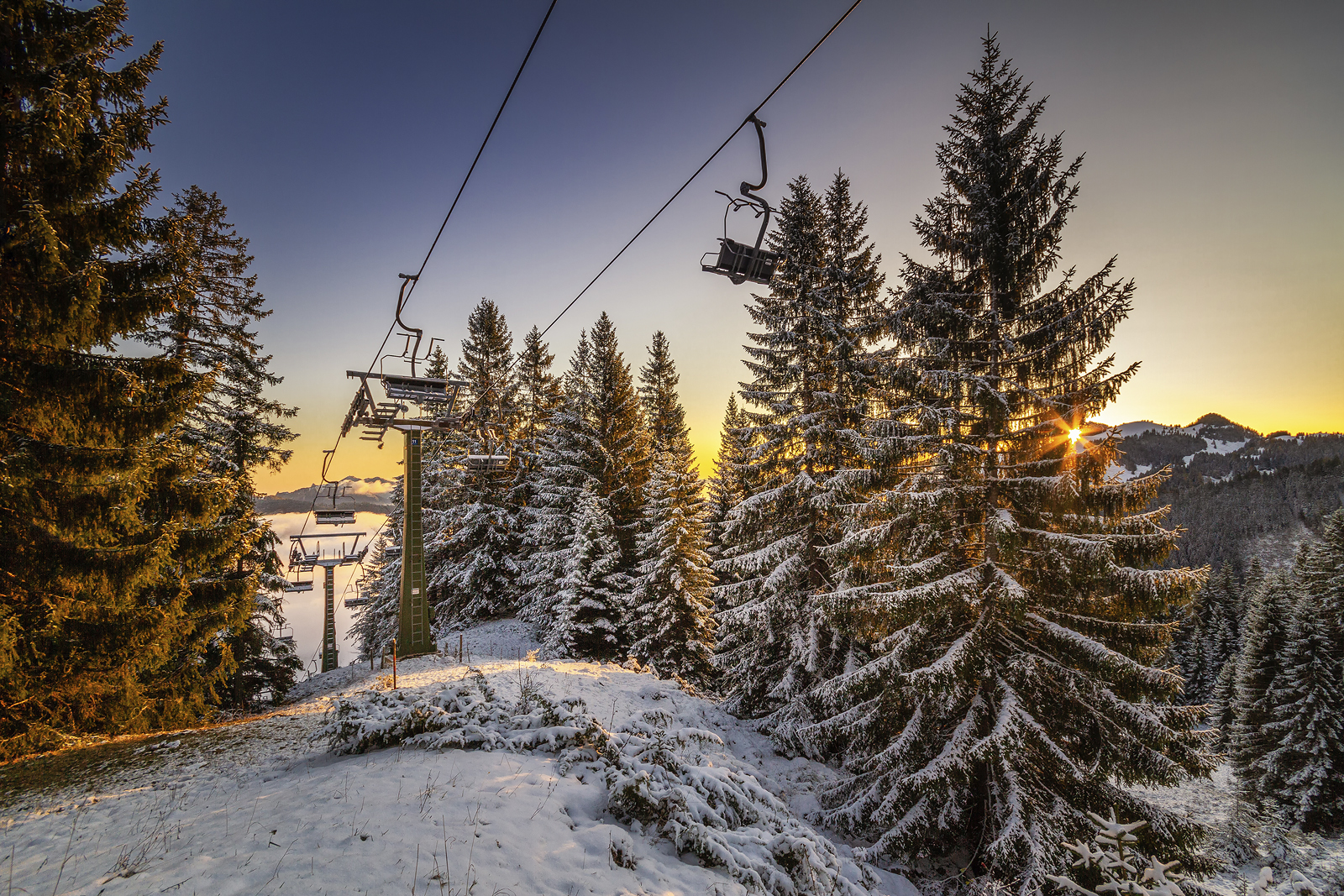 Snowmaking covered slopes and lifts at Sudelfeld near Bayrischzell