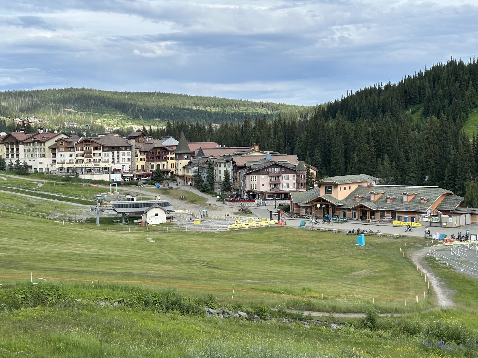 The timber village buildings of Sun Peaks under deep interior snow
