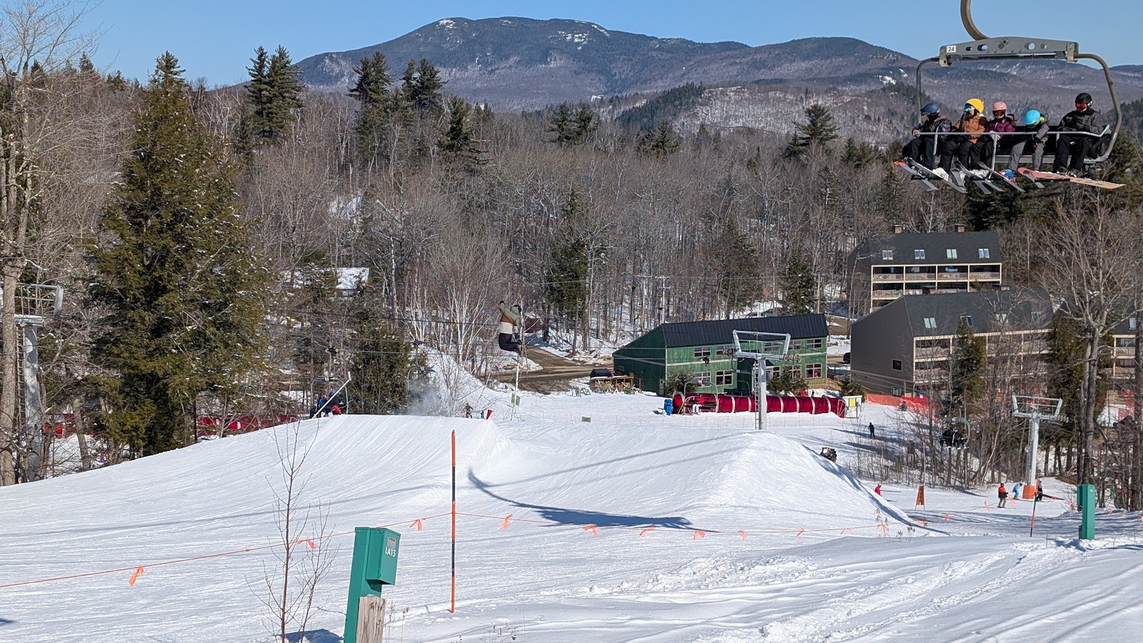 A chairlift over snow covered slopes at Sunday River