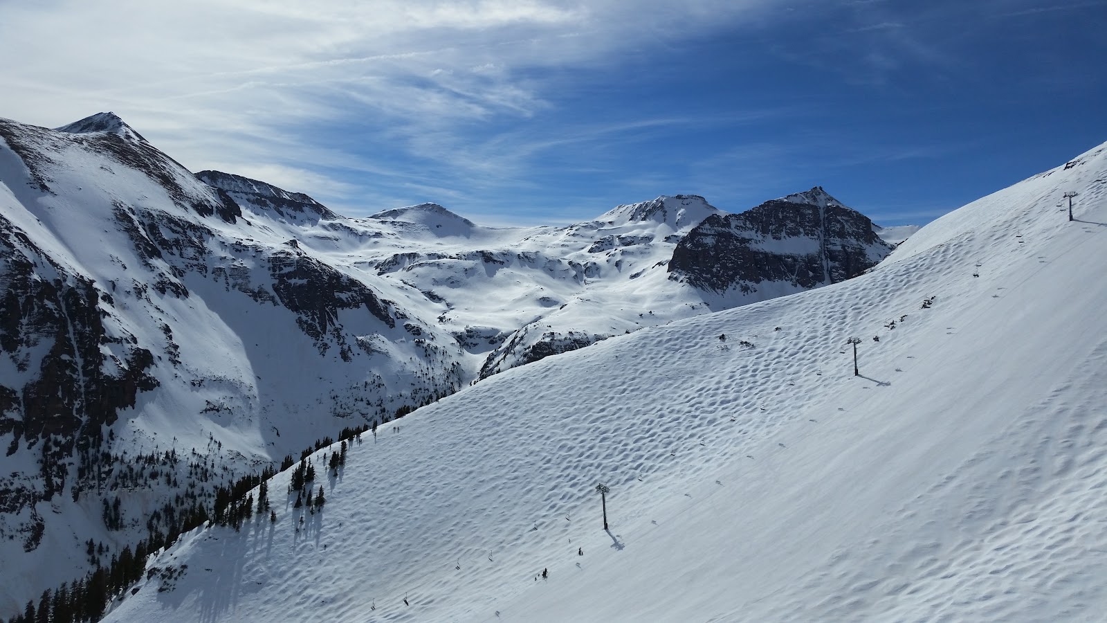 The free gondola climbing over the ridge between town and Mountain Village