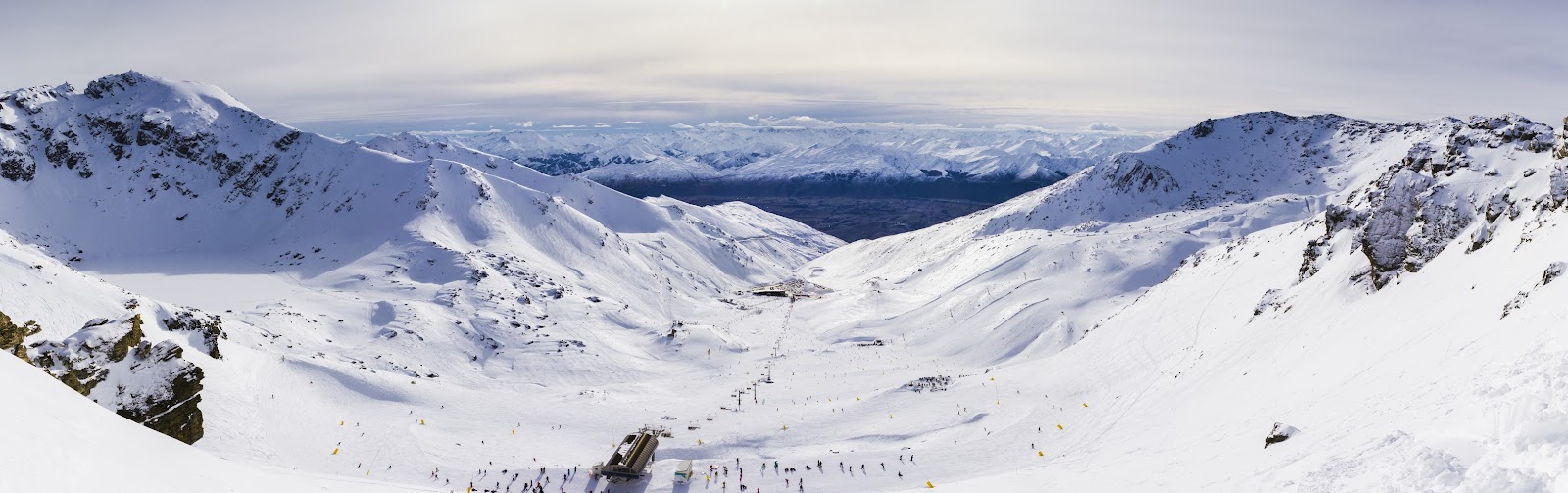 Sunny snow basins of The Remarkables ski area above Queenstown in New Zealand