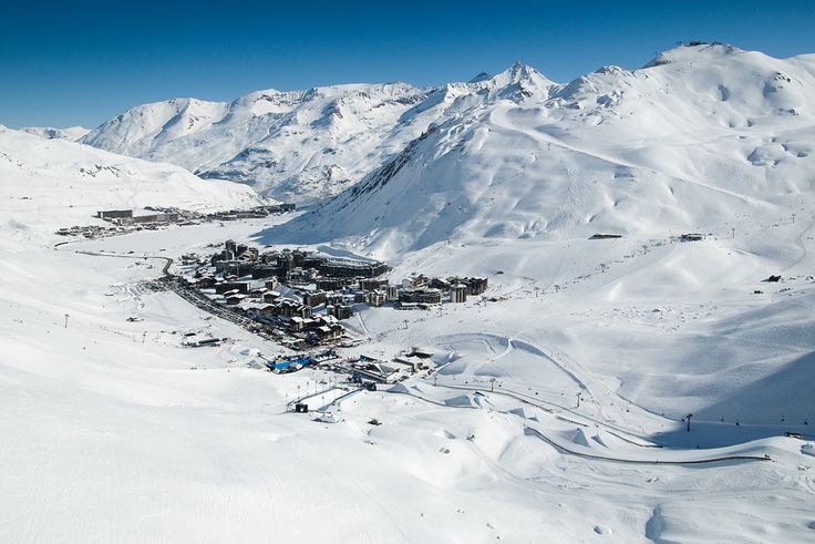 Tignes le Lac and its frozen lake under high winter snow