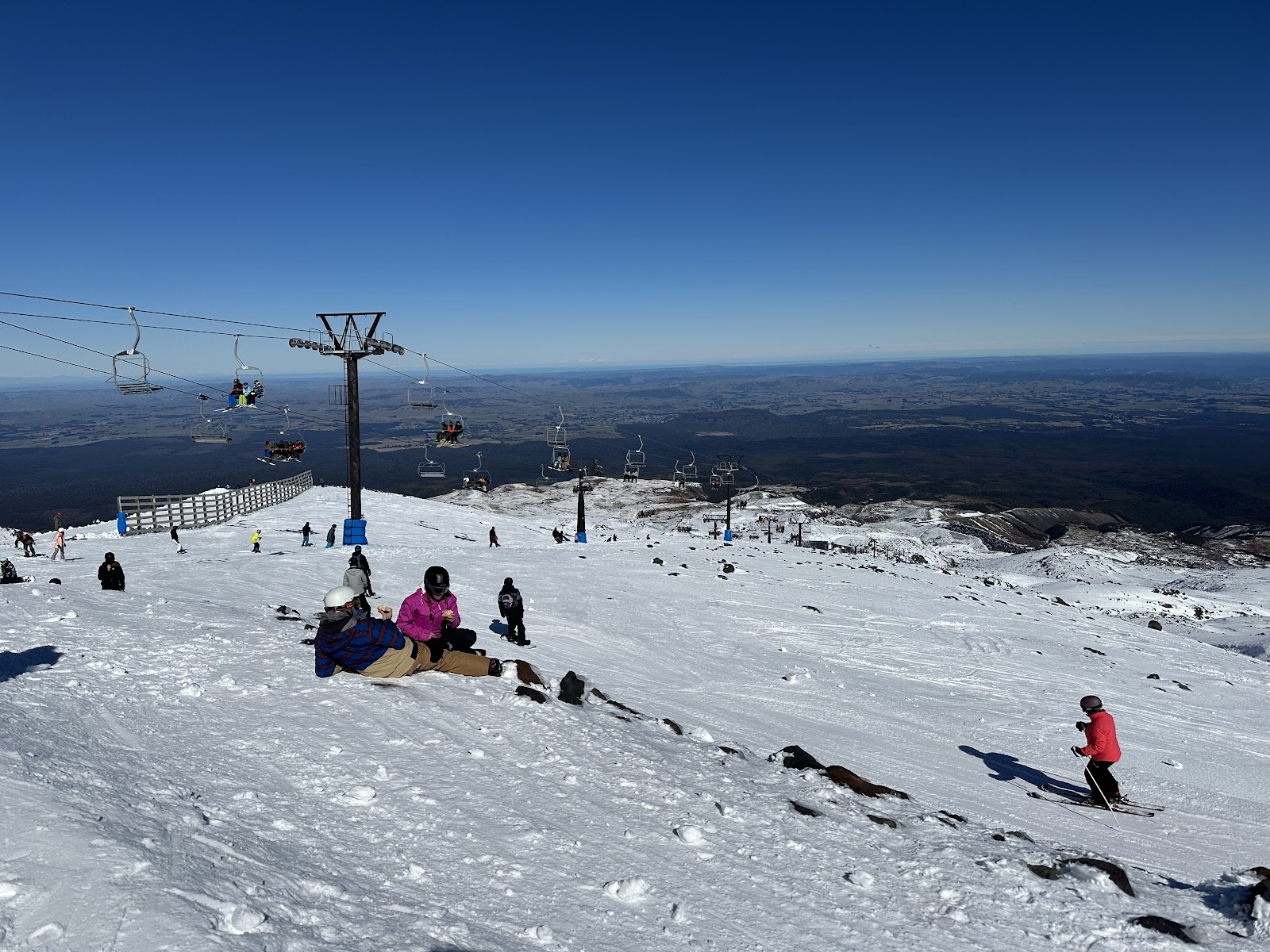 The snowy cone of Mount Ruapehu under a clear winter sky