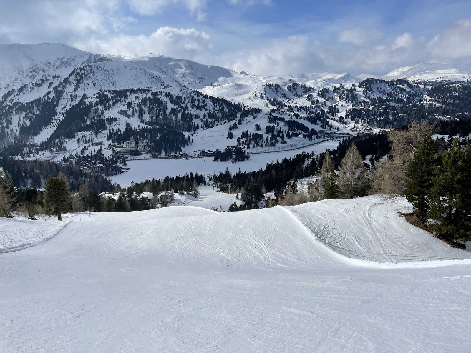 The high pistes above Turracher Hohe under blue sky